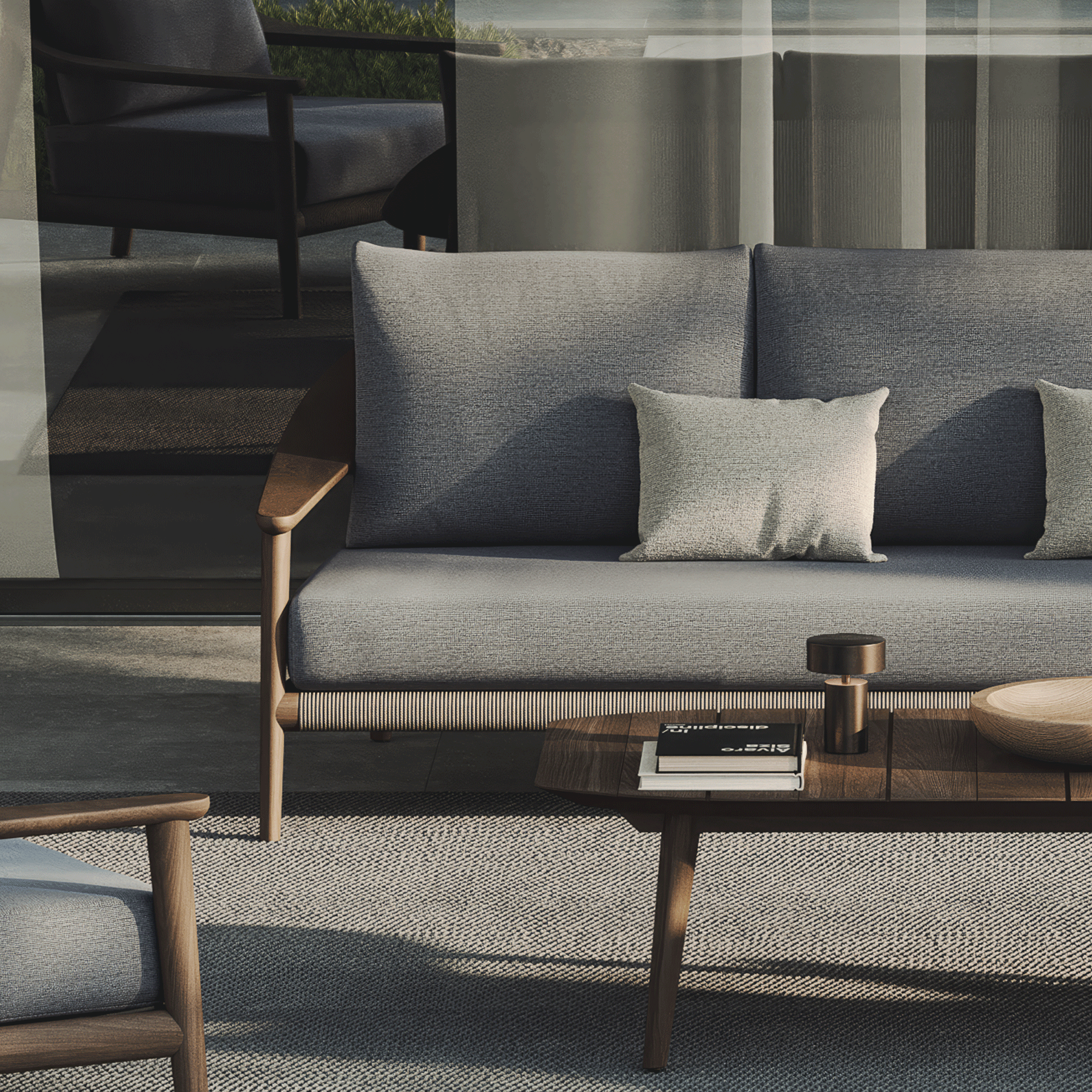 N1 luxury dark teak outdoor furniture with mid century inspired rope detail with outdoor coffee table and sofa set