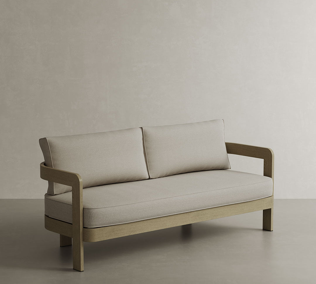 N3 Luxury Wood-Effect Aluminium Outdoor Sofa, featuring a high-quality aluminium frame with a realistic wood finish. The sofa is upholstered in soft sand-coloured outdoor fabric, accented with piping details for a sophisticated touch. Perfectly designed for durability and style, it adds both comfort and elegance to any outdoor living space.