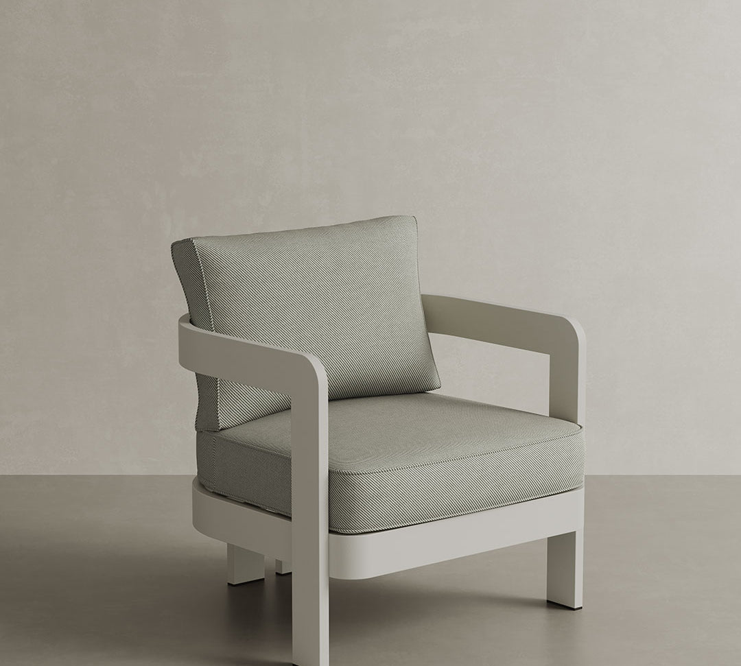 N3 Stone Sage Twill lounge chair, featuring soft, durable fabric in a sophisticated stone and sage combination. The chair is supported by a sleek aluminium frame, offering a modern design that blends comfort, style, and versatility for both indoor and outdoor use.