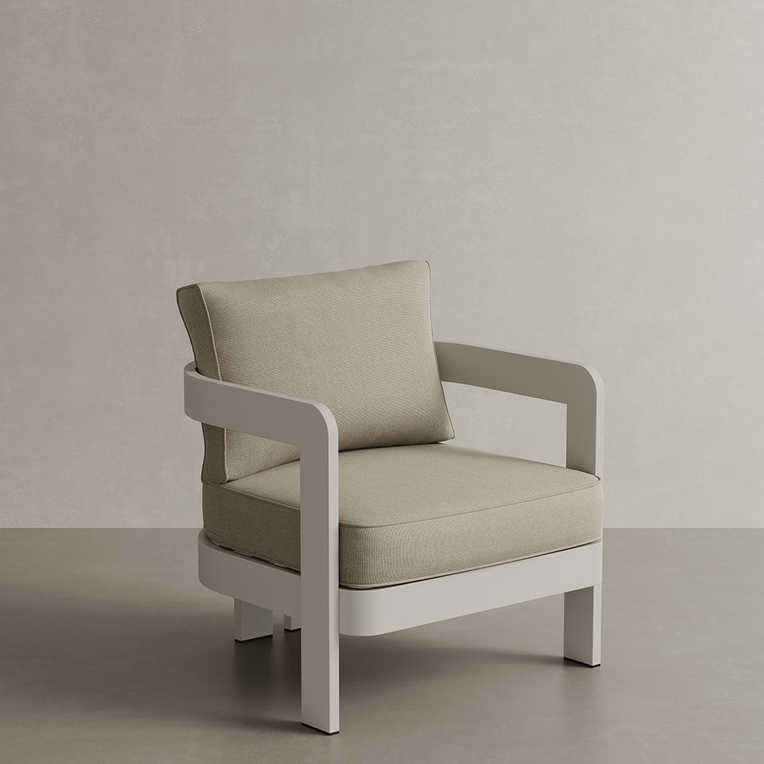 N3 Stone Sand canvas lounge chair, featuring soft, durable fabric in a gentle stone sand colour. The chair is supported by a sleek aluminium frame, blending modern design with comfort and durability, perfect for both indoor and outdoor spaces.