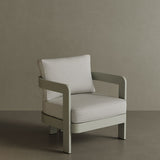 N3 Taupe Bone canvas lounge chair, featuring soft, durable fabric in a warm taupe bone colour. The chair is supported by a sleek aluminium frame, offering a modern design that combines comfort, elegance, and versatility for both indoor and outdoor spaces.