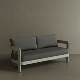 A luxurious N3 three-seater sofa in taupe smoke weave, featuring a sleek, modern design with soft, textured fabric. The sofa is supported by a durable aluminium frame, combining elegance with strength. Its neutral taupe colour and contemporary aesthetic make it a perfect addition to any outdoor living space, offering both style and comfort.