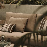 Close up life style image of N3 Three Seater Sofa Aluminium Oak Wheat Canvas