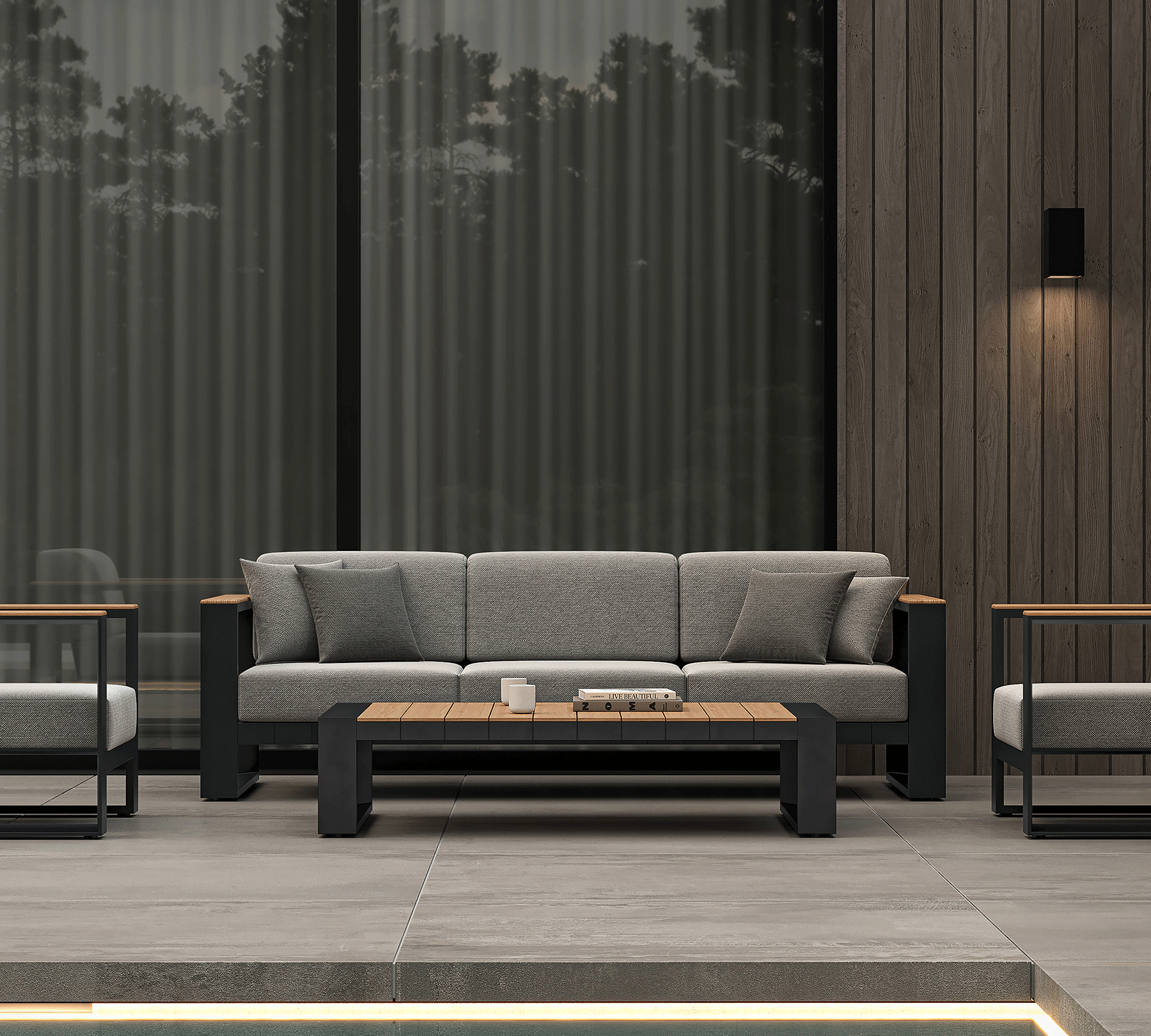 N5 three seater sofa black powder-coated aluminium frame with teak detailing lifestyle image