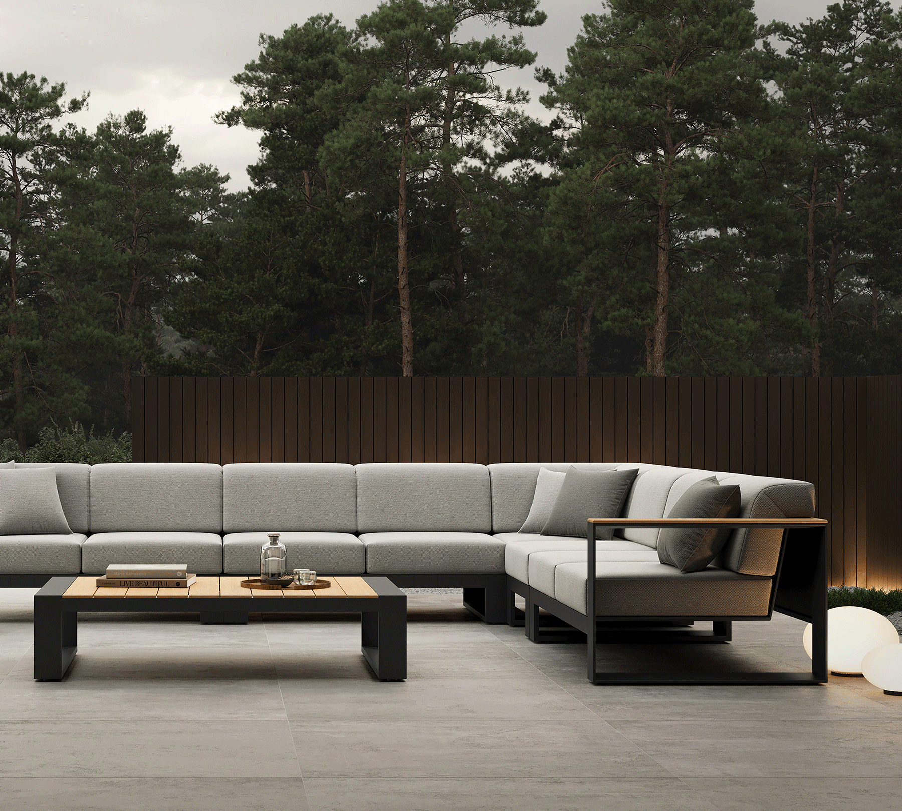 N5 sofa black powder-coated aluminium frame with teak detail lifestyle image