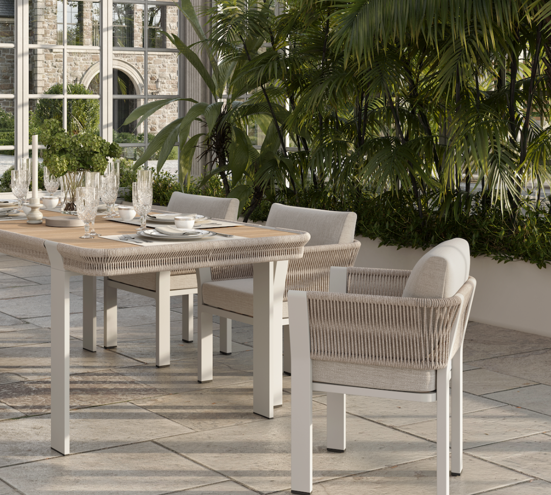 N7 luxury beige outdoor furniture with rope teak and aluminium detail with garden dining table and chairs in orangery