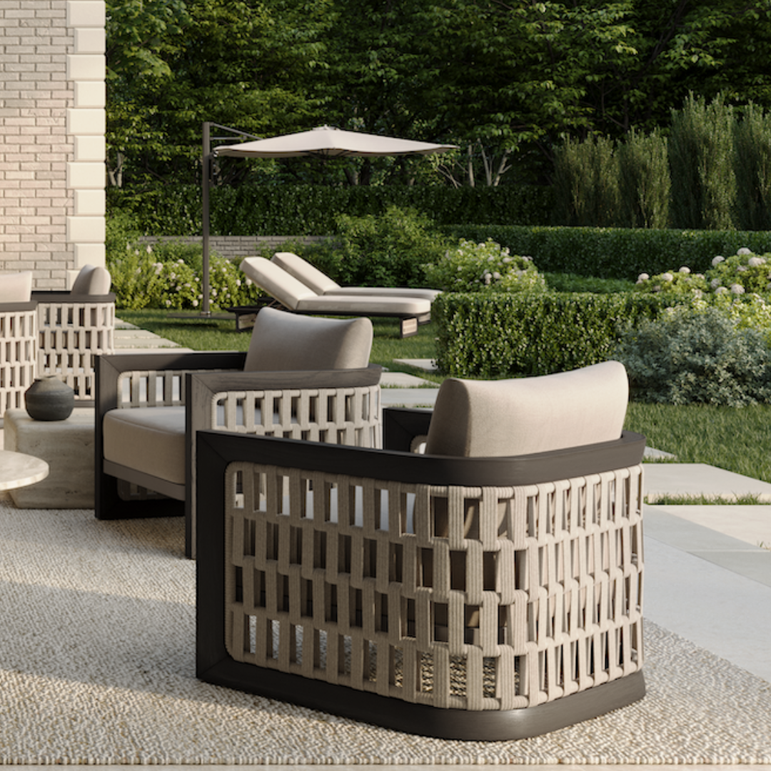 N2 dark teak outdoor furniture with modern rattan rope detail in luxury property with sun lounger and lounge chairs