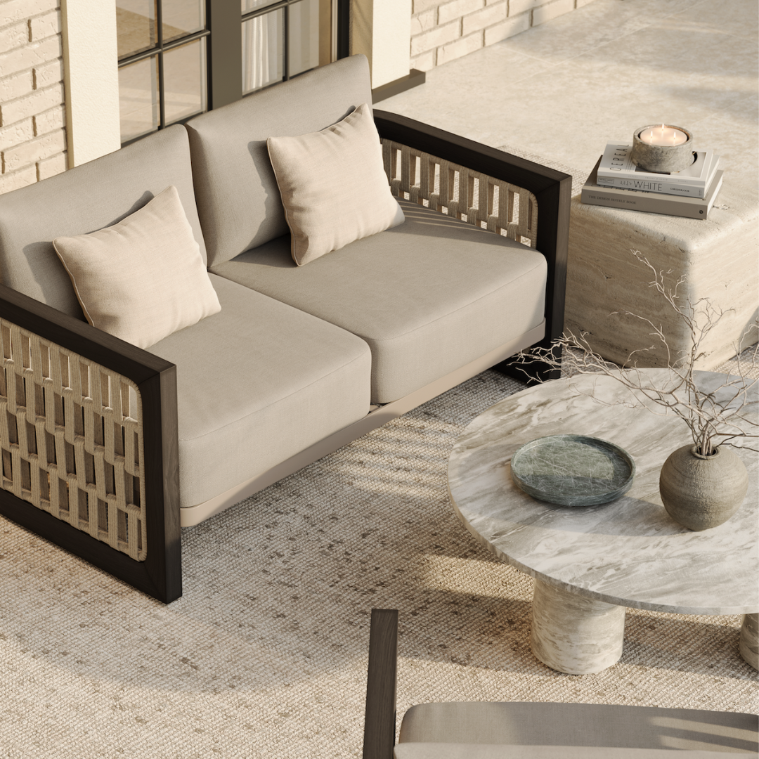N2 dark teak outdoor furniture with modern rattan rope detail in luxury property and marble coffee table