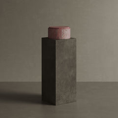 Caselle red travertine jar on pedestal