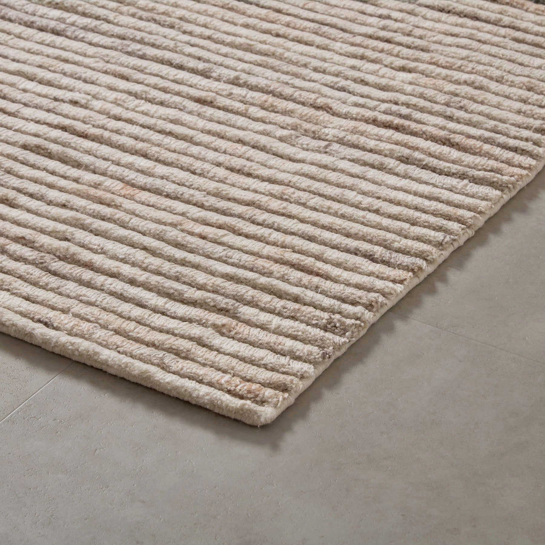 Close up of H1 rug in Champagne
