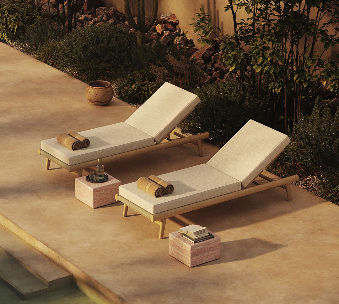 N1 light teak sun loungers and red travertine side tables