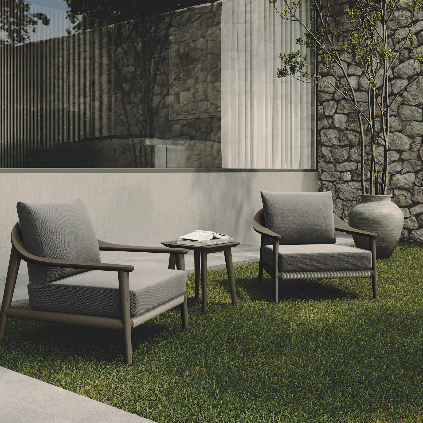 N1 Dark teak lounge chairs in luxury garden setting life style image