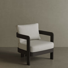 N3 Kohl Bone canvas lounge chair, featuring soft, durable fabric in a neutral bone colour. The chair is supported by a sleek aluminium frame, combining modern design with comfort and style, perfect for both indoor and outdoor settings.