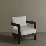 N3 Lounge Chair in Kohl Cirrus Textured Weave, featuring soft, durable fabric with a unique textured weave in a deep Kohl colour. The chair is supported by a sleek aluminium frame, offering a contemporary design that combines comfort, style, and durability for both indoor and outdoor spaces.