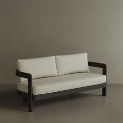 A luxurious N3 three-seater sofa in Kohl Pearl Herringbone, featuring a soft, textured fabric with a sophisticated herringbone pattern. The sleek aluminium frame offers modern durability, while the rich, dark colour adds depth and elegance. Its refined design makes it an ideal addition to any contemporary outdoor or indoor space, providing both style and comfort.