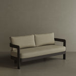 A contemporary N3 three-seater sofa in Kohl Sand canvas, featuring soft, durable fabric and a sleek aluminium frame. The sofa’s warm, neutral colour and modern design create an inviting and sophisticated look, making it a perfect addition to any outdoor space for both comfort and style.