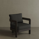 A sleek N3 Kohl Shadow canvas lounge chair, featuring soft, durable fabric in a rich Kohl Shadow colour. The chair's modern design and sturdy frame offer both comfort and elegance, making it a perfect addition to any outdoor or indoor lounge area. Its deep, dark tone adds sophistication and versatility to the space.