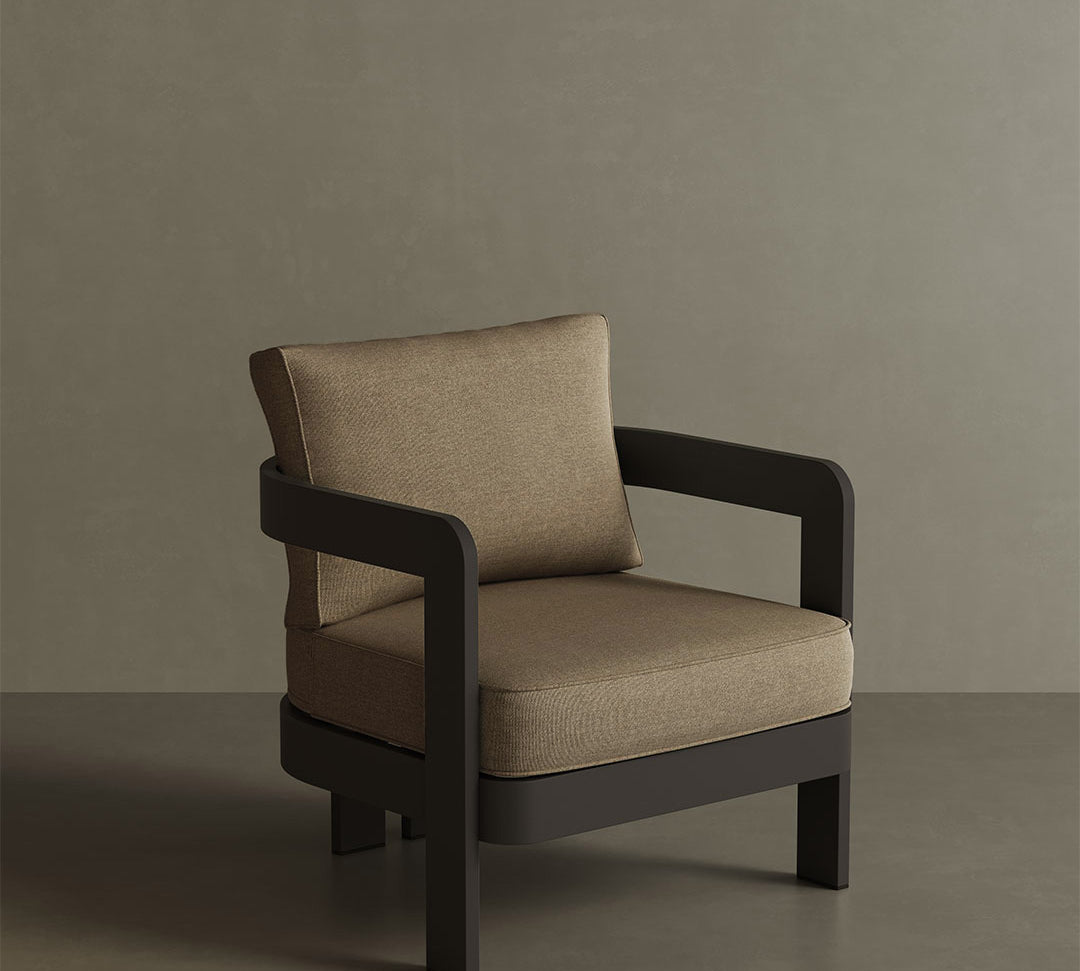 A contemporary N3 Kohl Wheat canvas lounge chair, featuring soft, durable fabric with a warm, neutral wheat tone. The sleek design and sturdy frame offer both comfort and modern style, making it a perfect addition to any outdoor or indoor lounge area. Its clean lines and versatile colour enhance the overall aesthetic of the space.