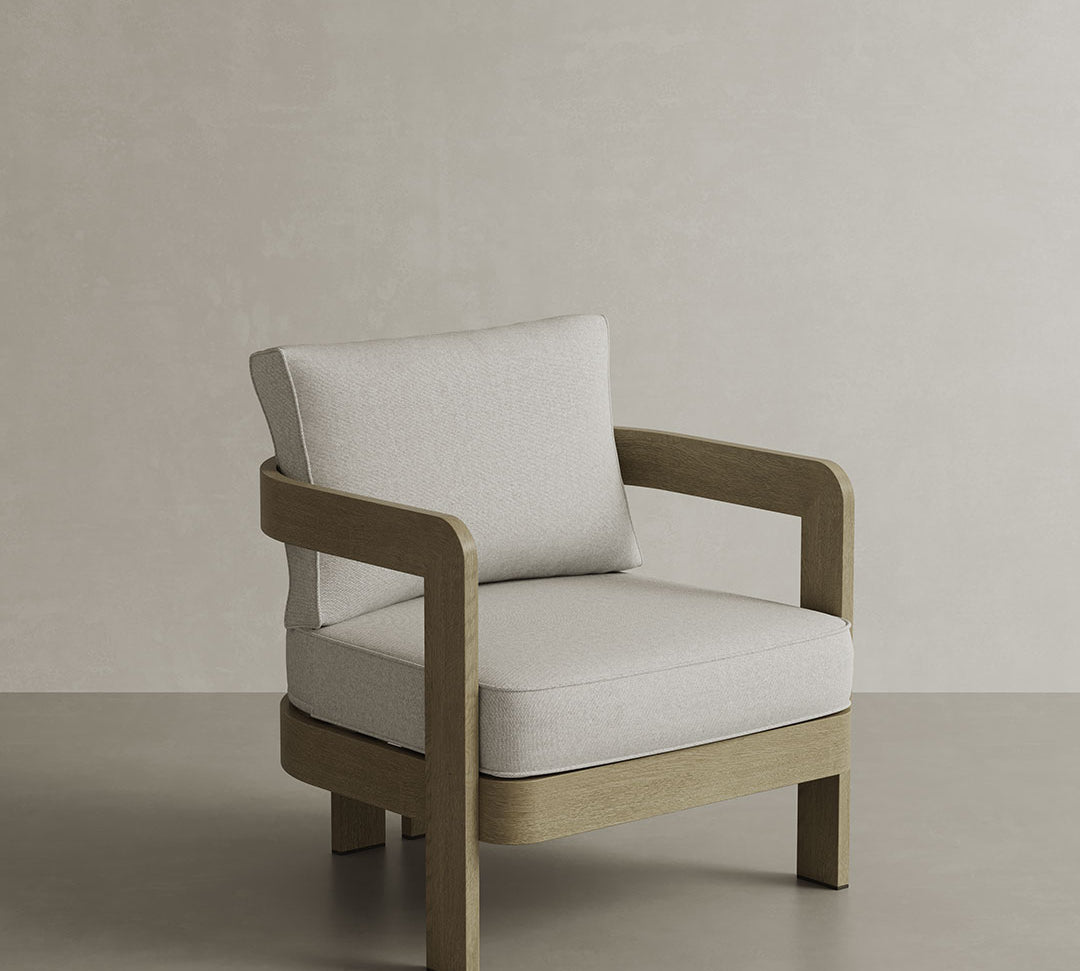 N3 Lounge Chair in Bone Canvas, featuring soft, durable fabric in a neutral bone colour. The chair is supported by a sleek aluminium frame, offering a contemporary design that blends comfort with modern style, perfect for both indoor and outdoor settings.