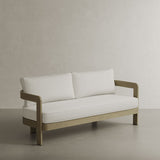 N3 Oak Cirrus Textured Weave Sofa, showcasing a soft, weather-resistant fabric with a subtle textured weave in a light oak hue. The sofa’s contemporary design is complemented by a strong, minimalist frame, blending comfort and sophistication to create a statement piece perfect for both indoor and outdoor settings.