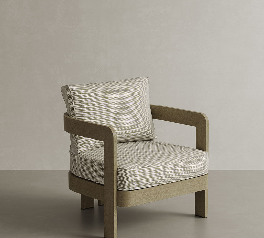 N3 Oak Pearl Herringbone Lounge Chair, featuring soft, durable fabric in a refined pearl colour with a classic herringbone pattern. The chair is supported by a sturdy oak frame, combining timeless design with comfort and elegance, perfect for both indoor and outdoor spaces.