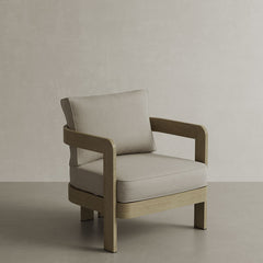 N3 Lounge Chair in Sand Canvas, showcasing a contemporary design with soft, weather-resistant fabric in a natural sand hue. The chair is complemented by a strong aluminium frame, providing both durability and a minimalist aesthetic, ideal for adding a stylish touch to any indoor or outdoor space.