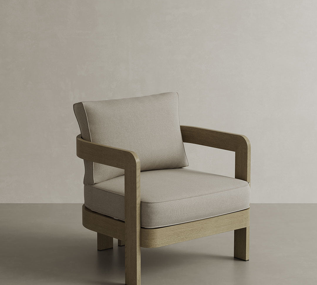 N3 Lounge Chair in Sand Canvas, showcasing a contemporary design with soft, weather-resistant fabric in a natural sand hue. The chair is complemented by a strong aluminium frame, providing both durability and a minimalist aesthetic, ideal for adding a stylish touch to any indoor or outdoor space.