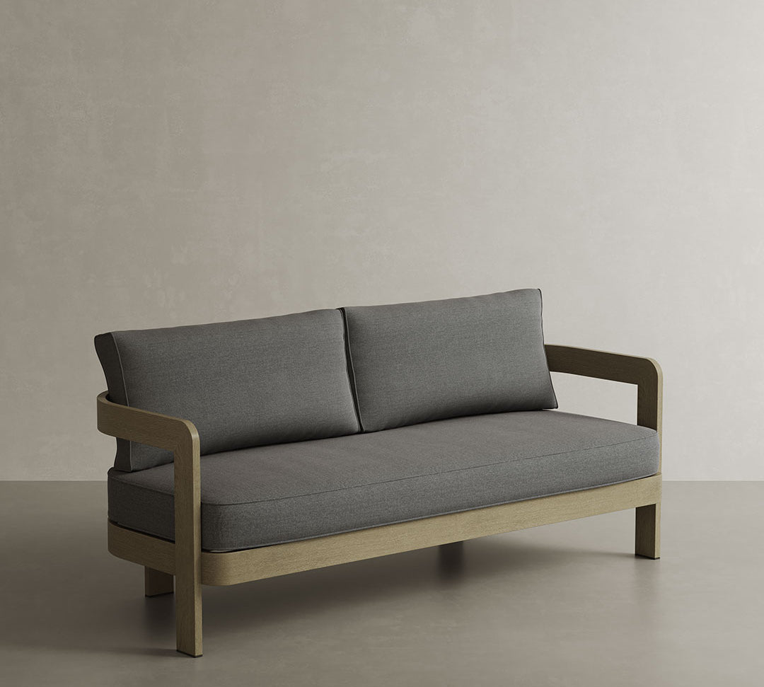 N3 Three-Seater Sofa in Smoke Weave, featuring a rich, woven fabric in a sleek smoke grey shade. The sofa’s modern design is paired with a sturdy frame, offering a stylish yet comfortable seating option that enhances any living space with its refined texture and contemporary appeal.