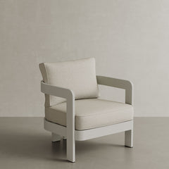 N3 Stone Bone canvas lounge chair, featuring soft, durable fabric in a refined stone bone colour. The chair is supported by a sleek aluminium frame, blending modern design with comfort and style, ideal for both indoor and outdoor settings.
