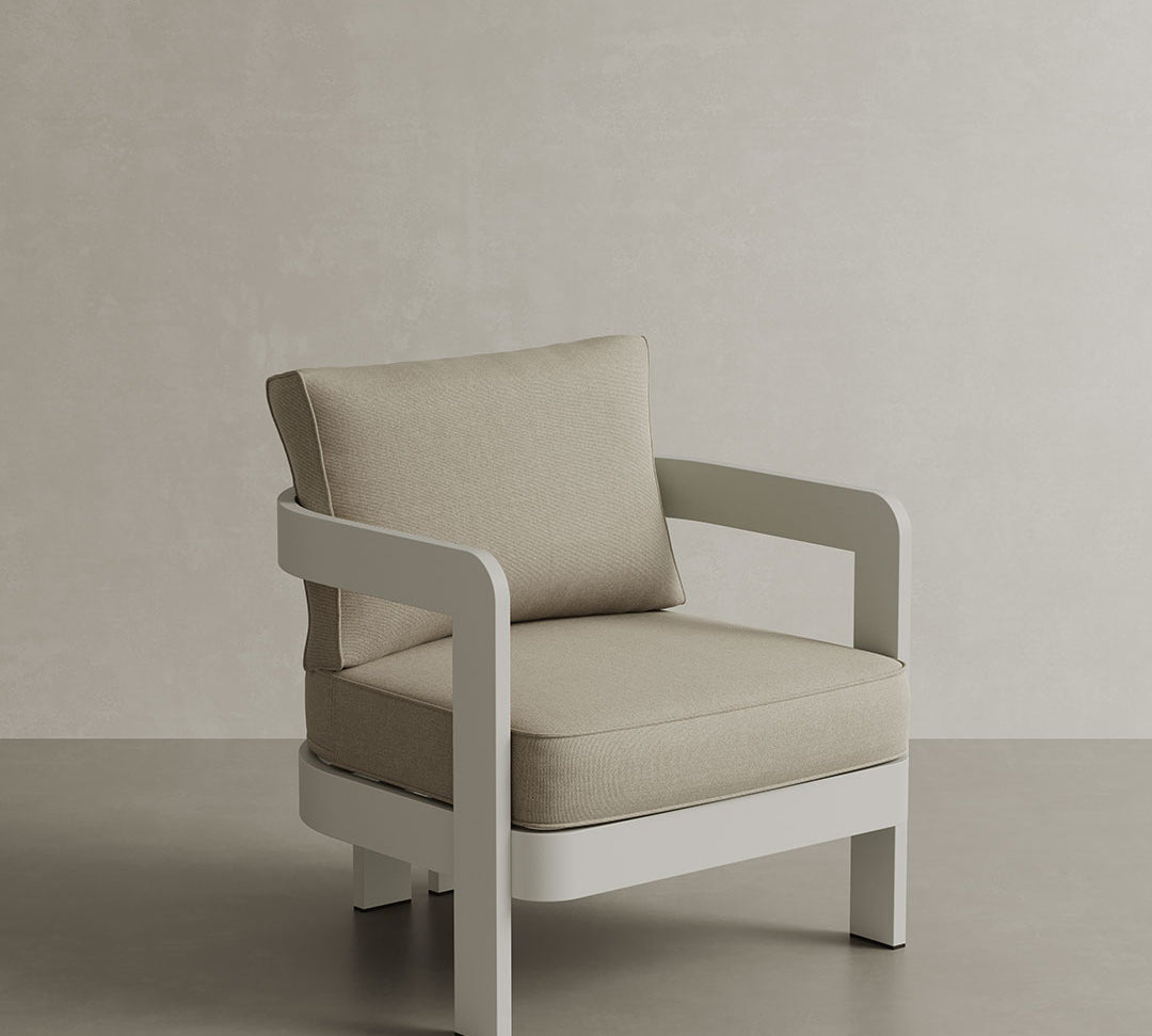 N3 Stone Sand canvas lounge chair, featuring soft, durable fabric in a gentle stone sand colour. The chair is supported by a sleek aluminium frame, blending modern design with comfort and durability, perfect for both indoor and outdoor spaces.