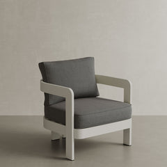 A refined N3 Stone Smoke Weave lounge chair, featuring soft, durable fabric with a subtle smoke weave pattern. The chair's modern design and sturdy frame provide both comfort and style, making it an ideal addition to any outdoor or indoor lounge area. Its neutral stone colour adds sophistication and versatility to the space.