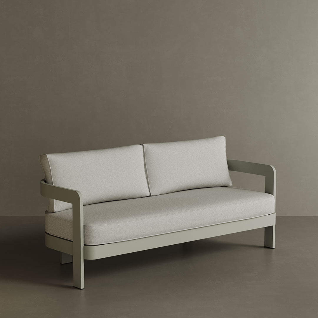 A sophisticated N3 three-seater sofa in Taupe Bone canvas, featuring soft, durable fabric with a subtle, neutral tone. The sleek aluminium frame adds a modern touch, ensuring both strength and elegance. Its versatile colour and clean design make it a perfect addition to any outdoor or indoor space, offering both style and comfort.