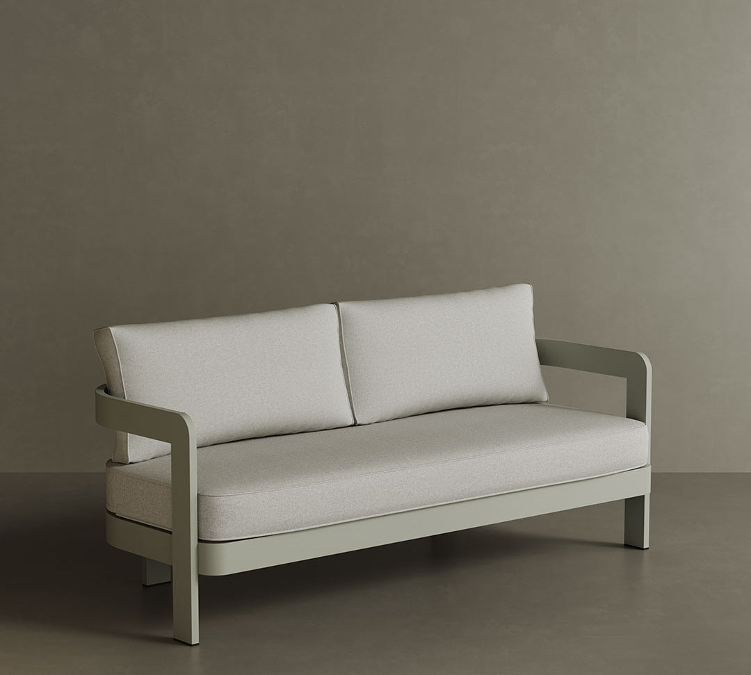 A sophisticated N3 three-seater sofa in Taupe Bone canvas, featuring soft, durable fabric with a subtle, neutral tone. The sleek aluminium frame adds a modern touch, ensuring both strength and elegance. Its versatile colour and clean design make it a perfect addition to any outdoor or indoor space, offering both style and comfort.