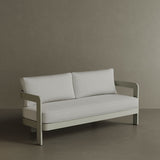 A stylish N3 three-seater sofa in Taupe Cirrus Textured Weave, featuring soft, durable fabric with a refined textured finish. The sleek aluminium frame adds a modern touch, combining durability with elegance. Its warm taupe colour and contemporary design make it a sophisticated addition to any outdoor or indoor space, offering both comfort and style.