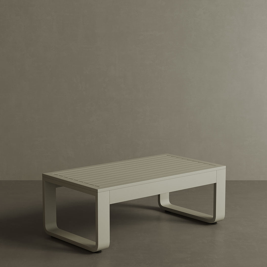A luxurious taupe aluminium outdoor coffee table with a sleek, modern design. The table features a smooth, matte finish and sturdy construction, making it both stylish and durable for outdoor use. Its neutral taupe colour adds a sophisticated touch to any patio or garden, creating a chic and contemporary focal point for your outdoor space.