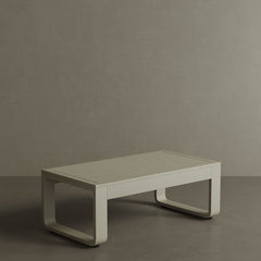 A luxurious taupe aluminium outdoor coffee table with a sleek, modern design. The table features a smooth, matte finish and sturdy construction, making it both stylish and durable for outdoor use. Its neutral taupe colour adds a sophisticated touch to any patio or garden, creating a chic and contemporary focal point for your outdoor space.