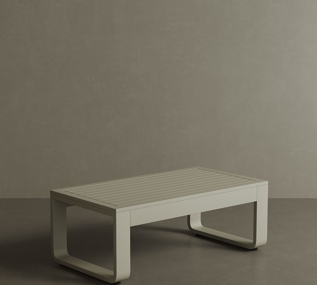 A luxurious taupe aluminium outdoor coffee table with a sleek, modern design. The table features a smooth, matte finish and sturdy construction, making it both stylish and durable for outdoor use. Its neutral taupe colour adds a sophisticated touch to any patio or garden, creating a chic and contemporary focal point for your outdoor space.