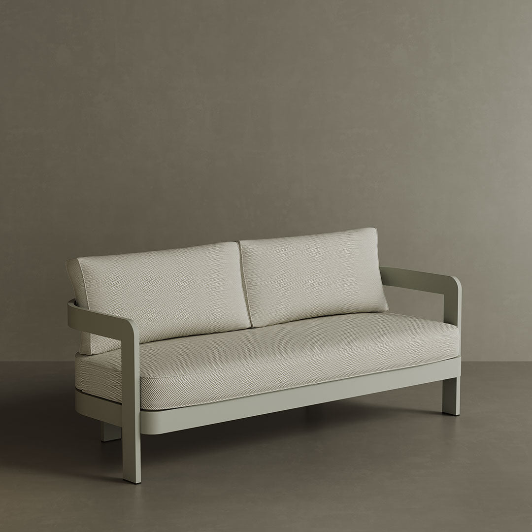 A stylish N3 three-seater sofa in Taupe Pearl Herringbone, featuring soft, durable fabric with a subtle herringbone pattern. The sleek aluminium frame adds a modern touch, ensuring both strength and elegance. Its warm taupe colour and refined design make it a versatile and sophisticated addition to any outdoor or indoor space.
