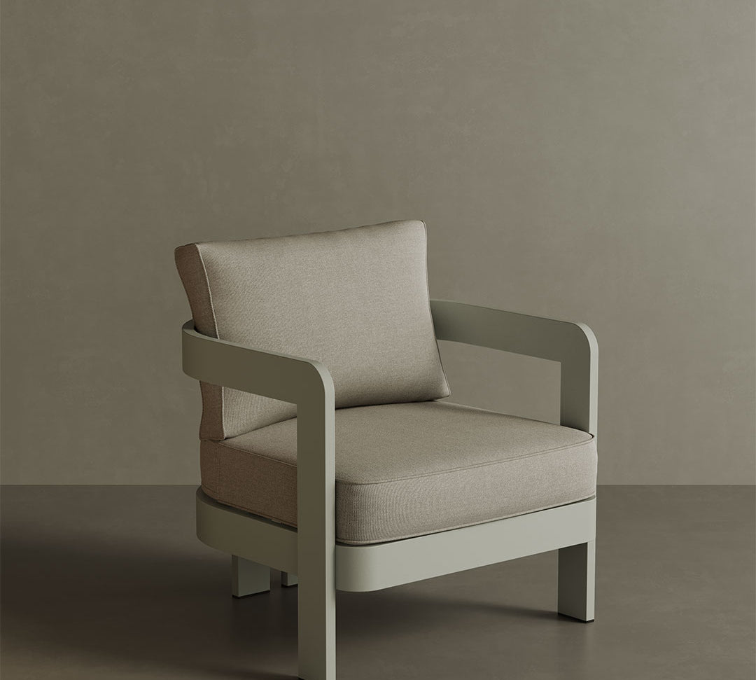 N3 Taupe Sand canvas lounge chair, featuring soft, durable fabric in a subtle taupe sand colour. The chair is supported by a sleek aluminium frame, offering a modern design that combines comfort and style, ideal for both indoor and outdoor use.
