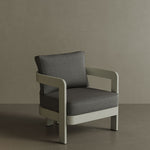 A stylish N3 Taupe Smoke Weave lounge chair, featuring soft, durable fabric with a refined smoke weave pattern. The sleek design and sturdy frame offer both comfort and contemporary elegance, making it a perfect addition to any outdoor or indoor lounge space. Its warm taupe colour adds a sophisticated touch to the overall aesthetic.