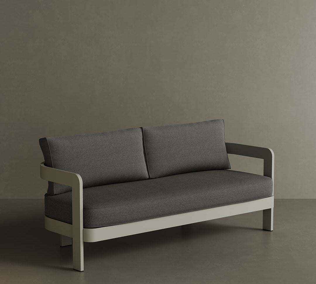 A luxurious N3 three-seater sofa in taupe smoke weave, featuring a sleek, modern design with soft, textured fabric. The sofa is supported by a durable aluminium frame, combining elegance with strength. Its neutral taupe colour and contemporary aesthetic make it a perfect addition to any outdoor living space, offering both style and comfort.