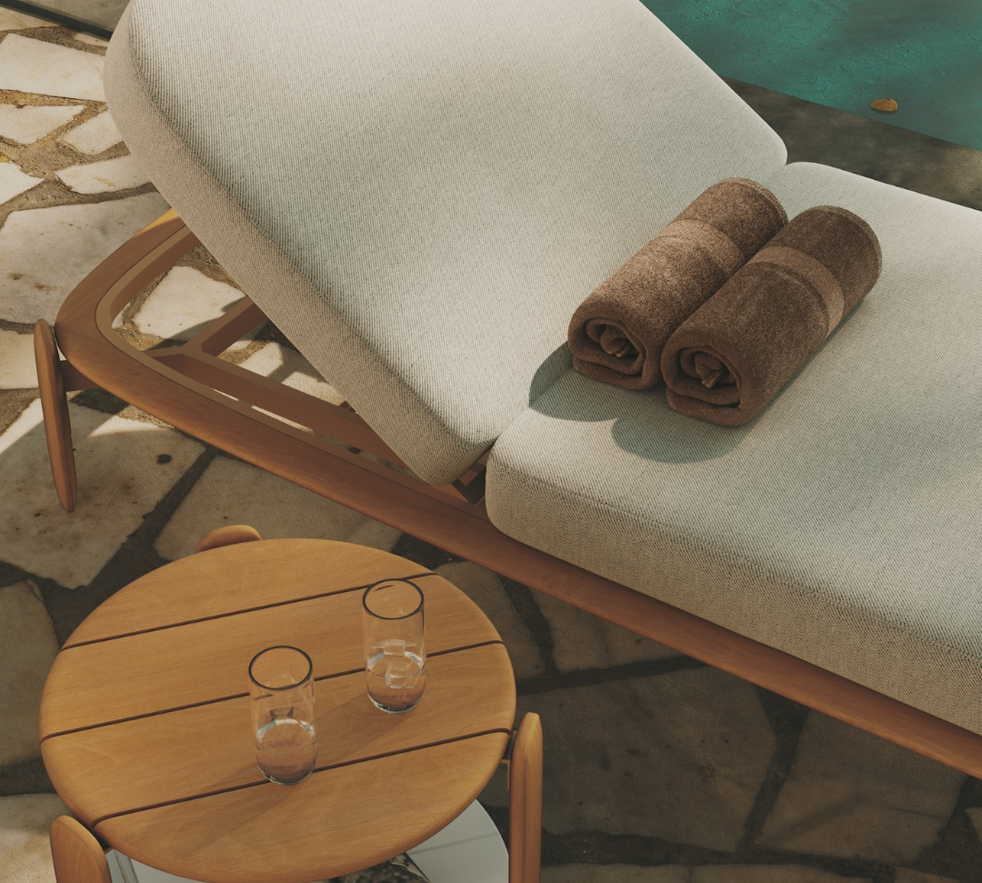 N4 sun lounger and side table in medium teak life style image