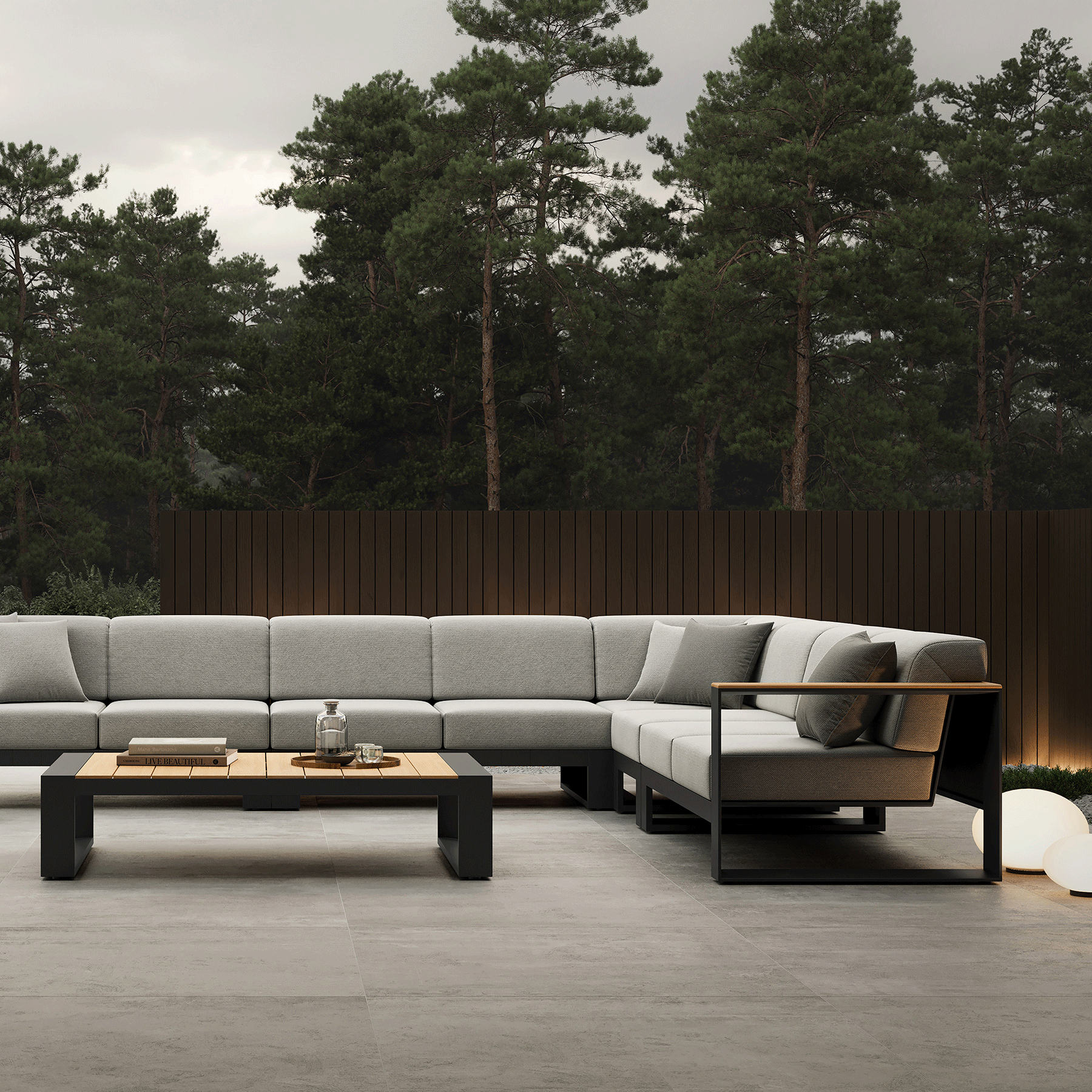 N5 sofa black powder-coated aluminium frame with teak detail lifestyle imagine