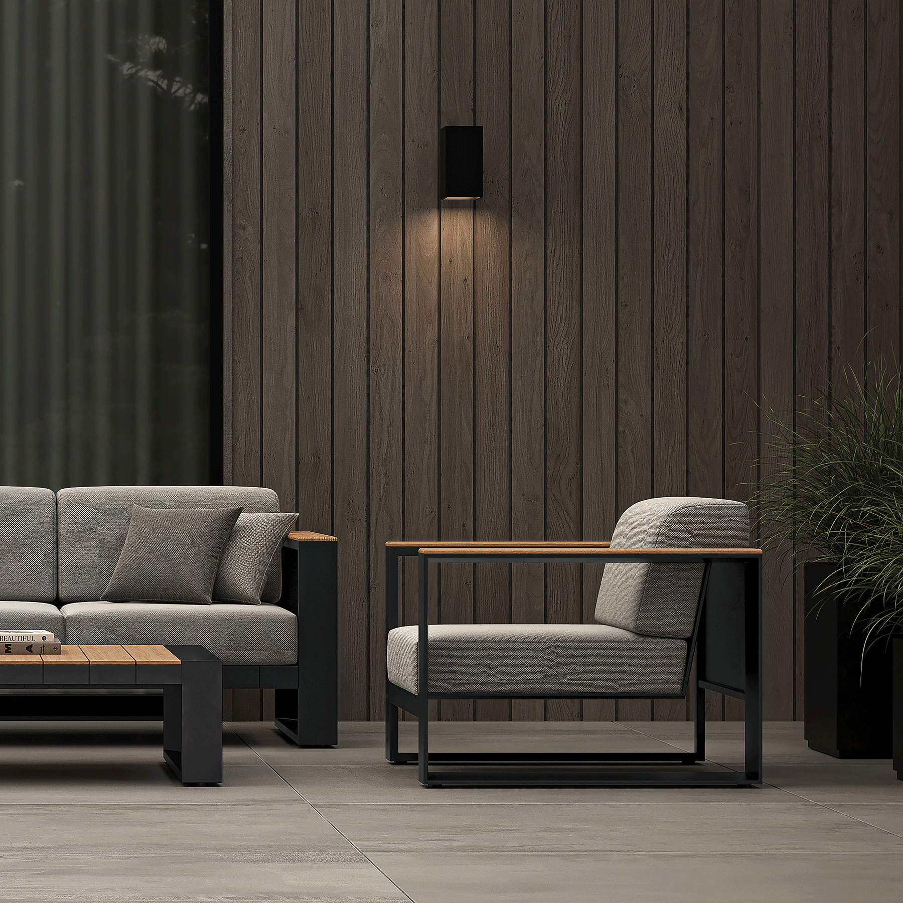 N5 lounge chair black powder-coated aluminium frame with teak detail lifestyle imagine