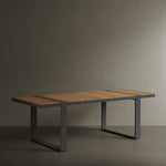 N5 six seater dining table black powder-coated aluminium frame with teak detail lifestyle image