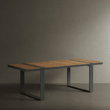 N5 six seater dining table black powder-coated aluminium frame with teak detail lifestyle image