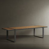 N5 eight seater dining table black powder-coated aluminium frame with teak detail lifestyle image