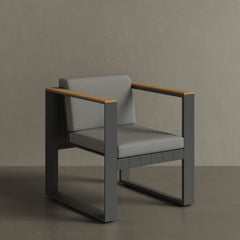 N5 dining chair black powder-coated aluminium frame with teak detail lifestyle image