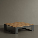 N5 square coffee table black powder-coated aluminium frame with teak detail lifestyle image