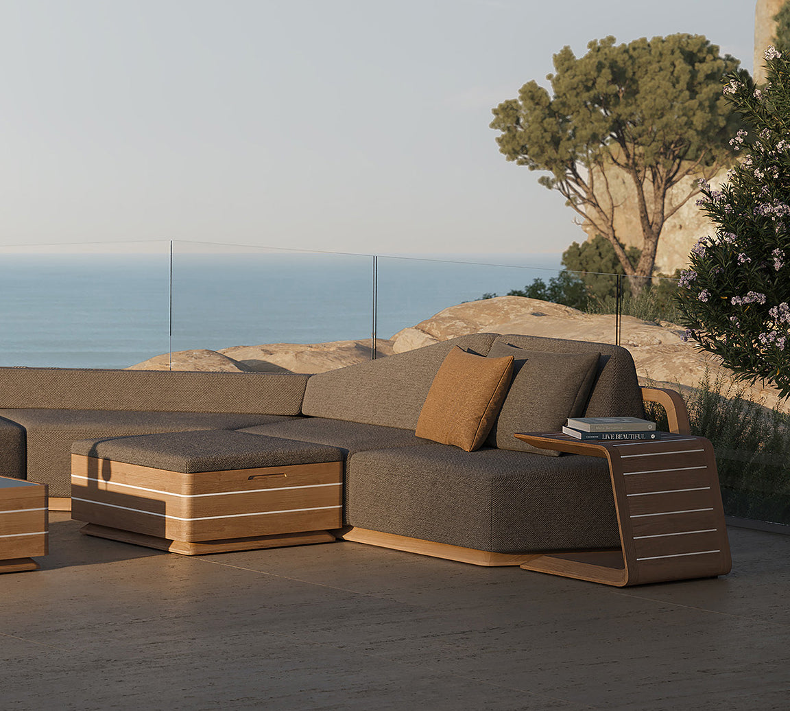 N6 dark corner sofa with footstool and side table lifestyle image of luxury living